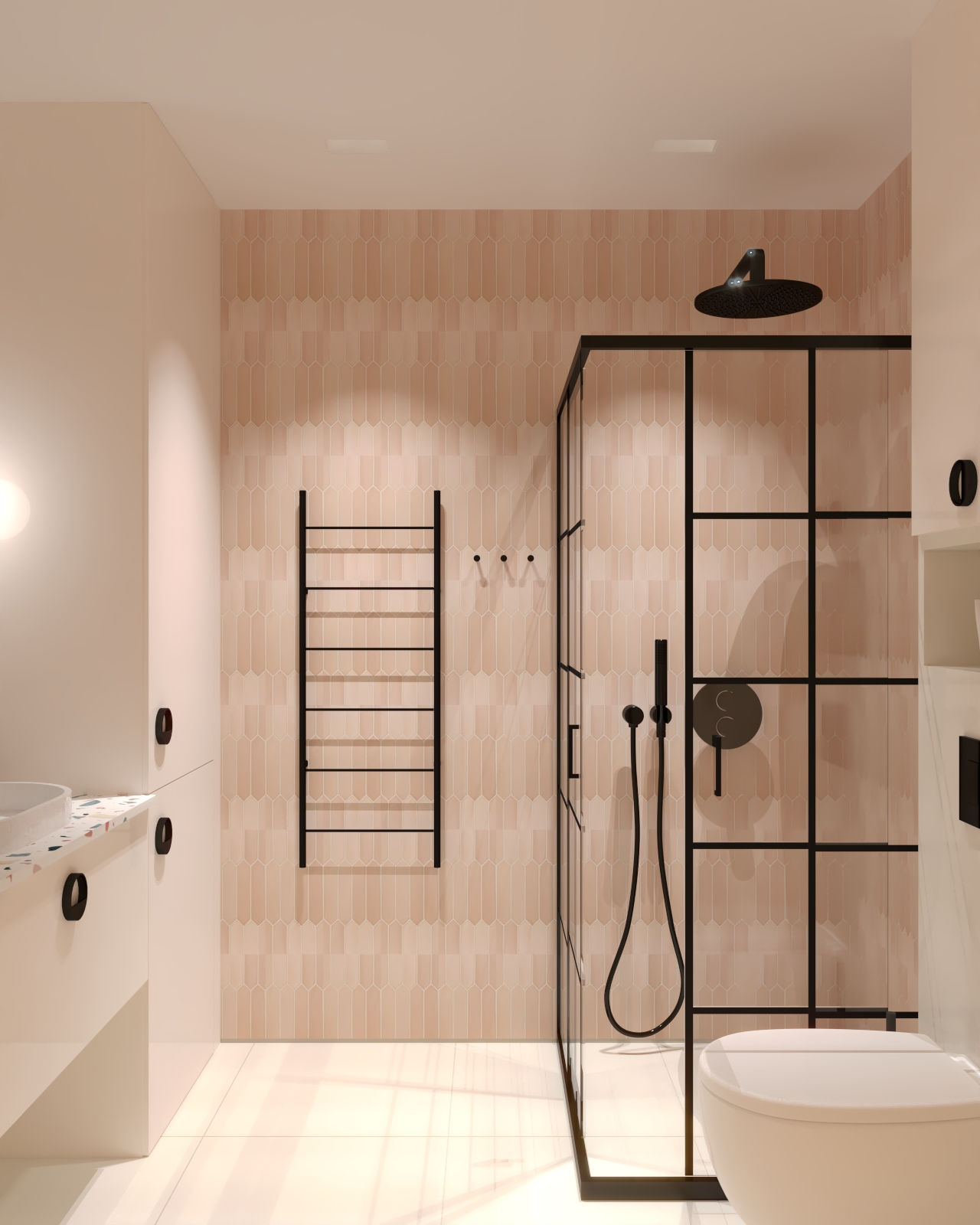 Różowa łazienka z czarnym prysznicem i różowymi płytkami oraz blatem lastryko