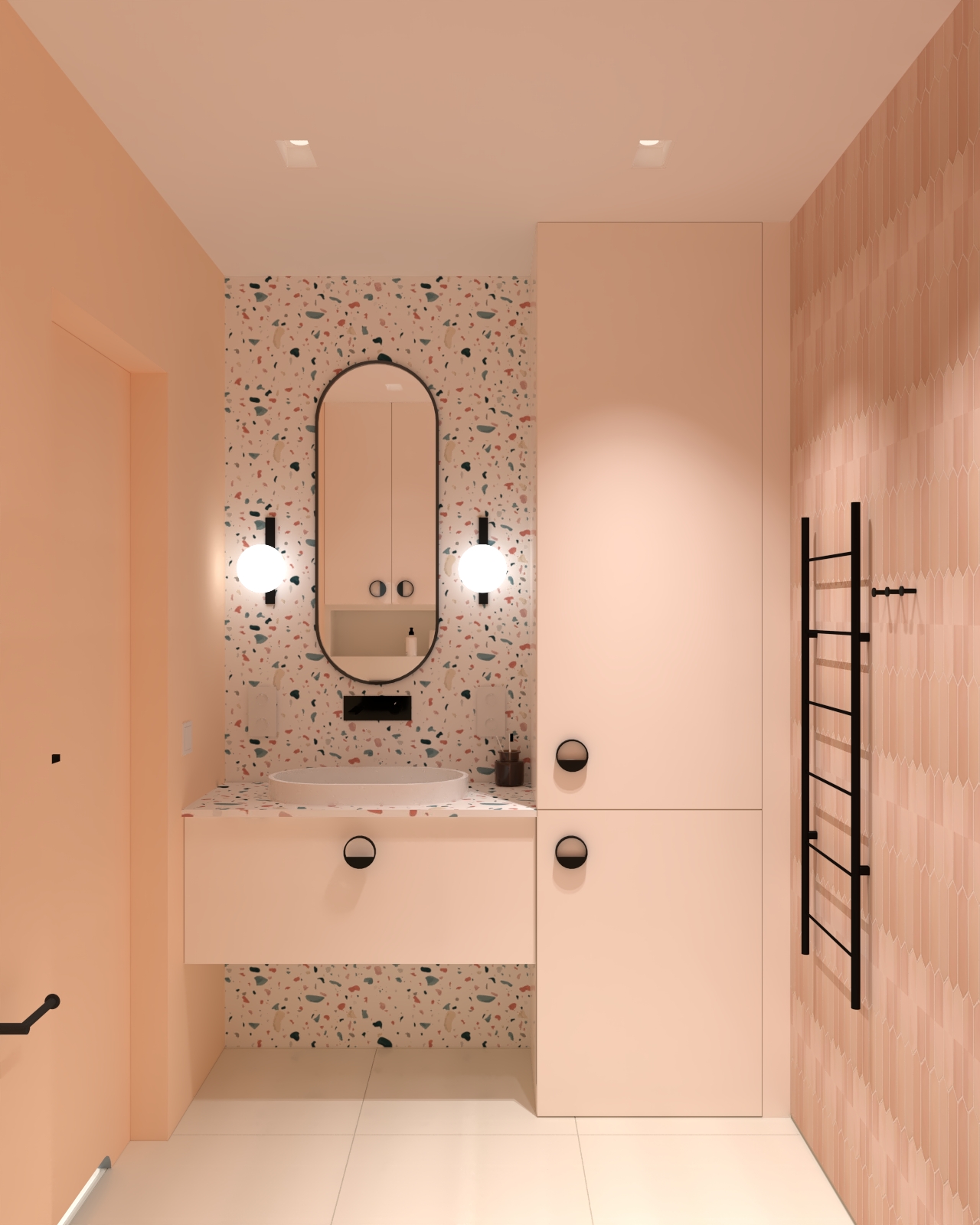 Różowa łazienka z owalnym lustrem, blatem lastryko, terazzo i czarnymi dodatkami